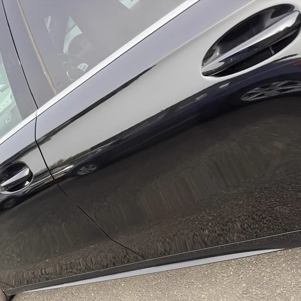 Black door scratch repair after repair