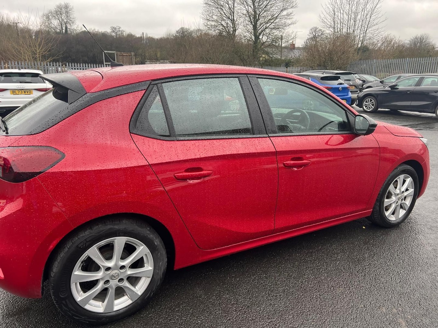 Vehicle prepared for paint with full masking and clean panel lines